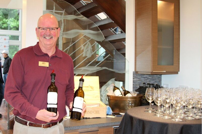 Above: Representatives of DeLille Cellars were all smiles as they served tastings of their award-winning wines during the LOL event.